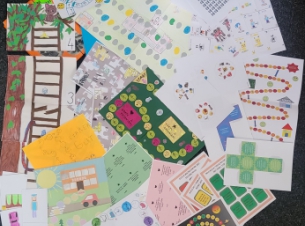 gry stworzone przez uczestników konkursu rozłożone na dywanie